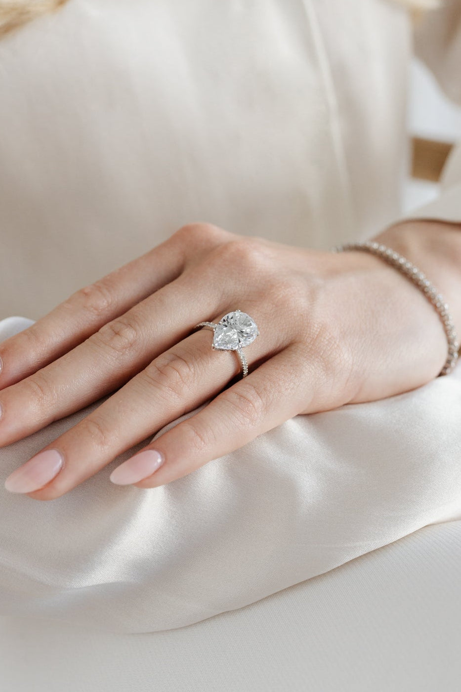 Pear solitaire engagament ring with pave band - platinum