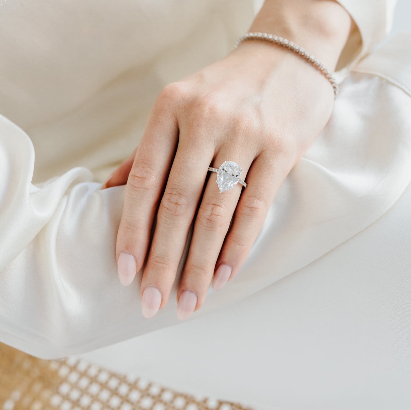 Pear solitaire engagament ring with pave band - platinum