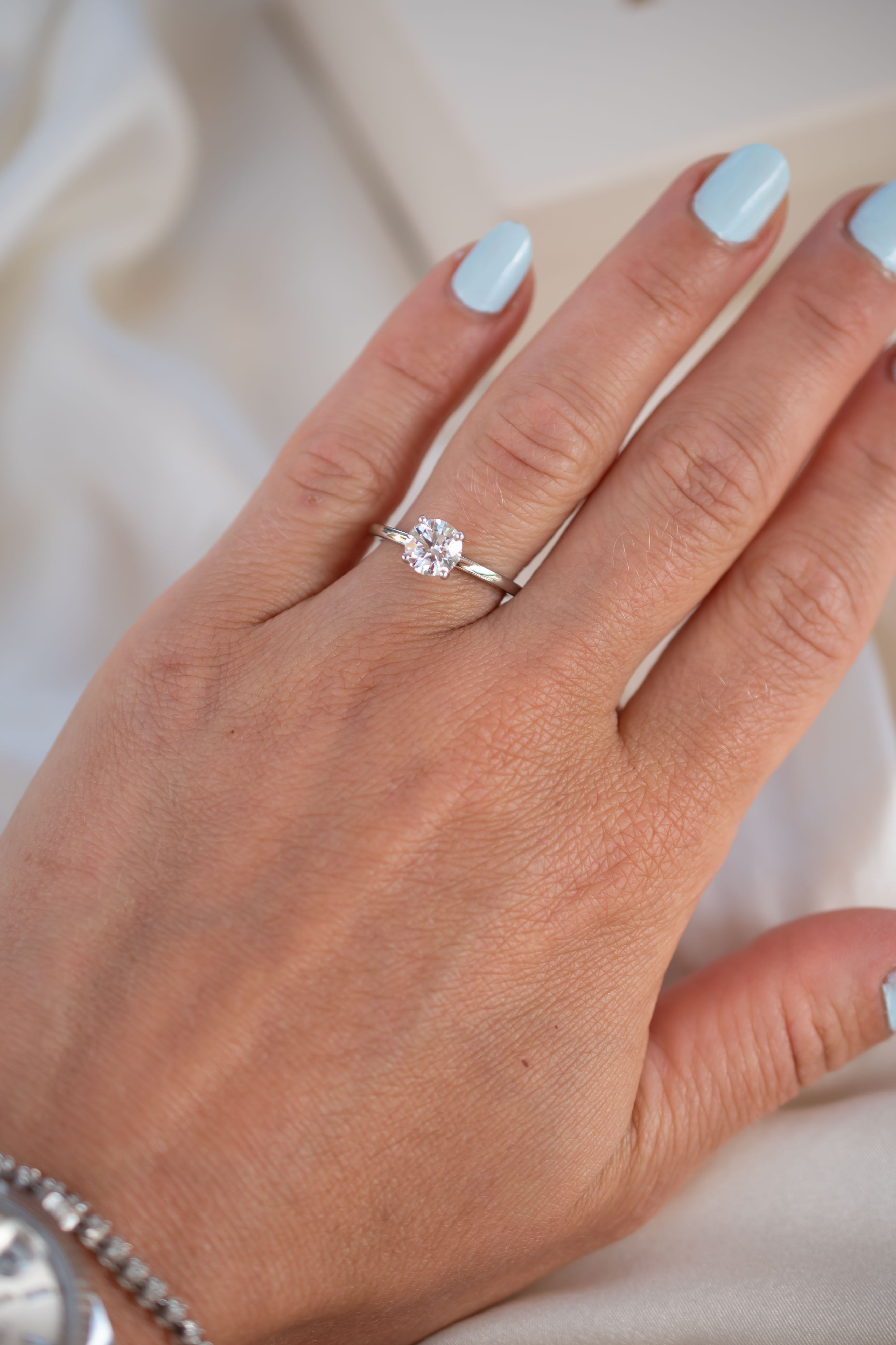 Round solitaire engagement ring - platinum