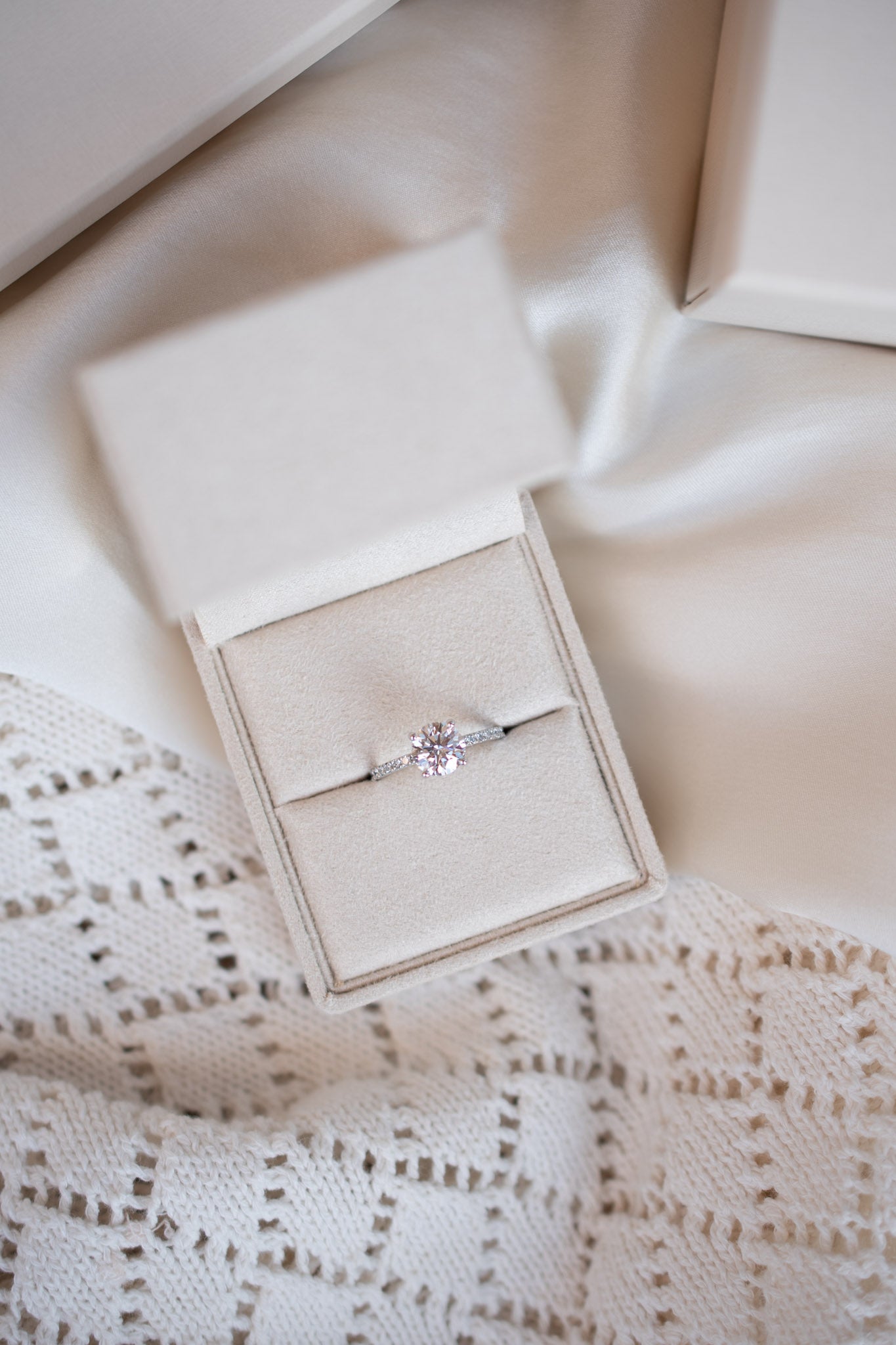 Round solitaire engagement ring with pave band - platinum