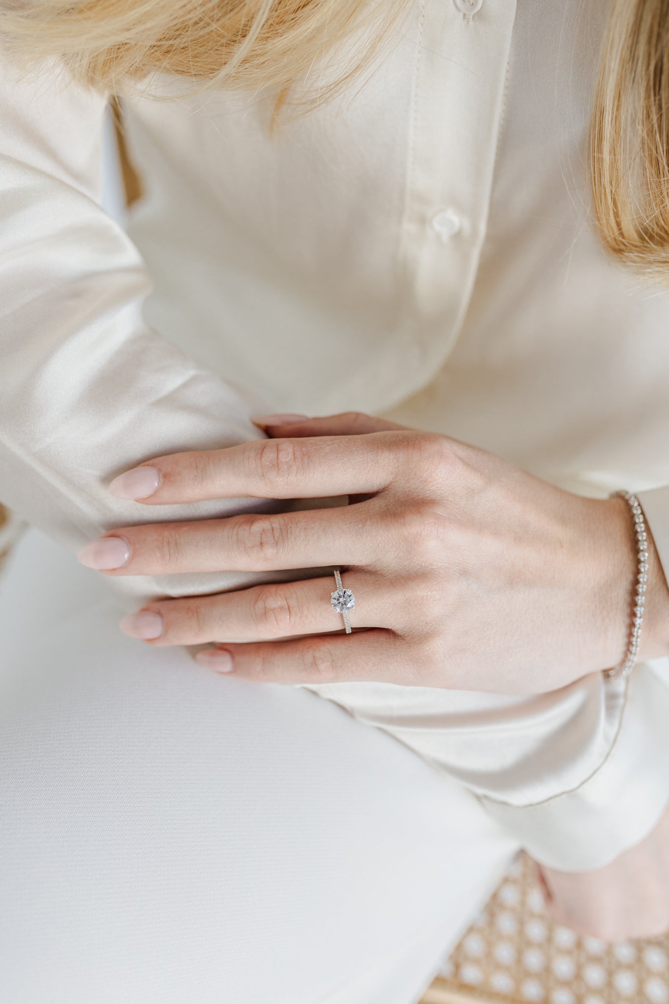 Round solitaire engagement ring with pave band - platinum