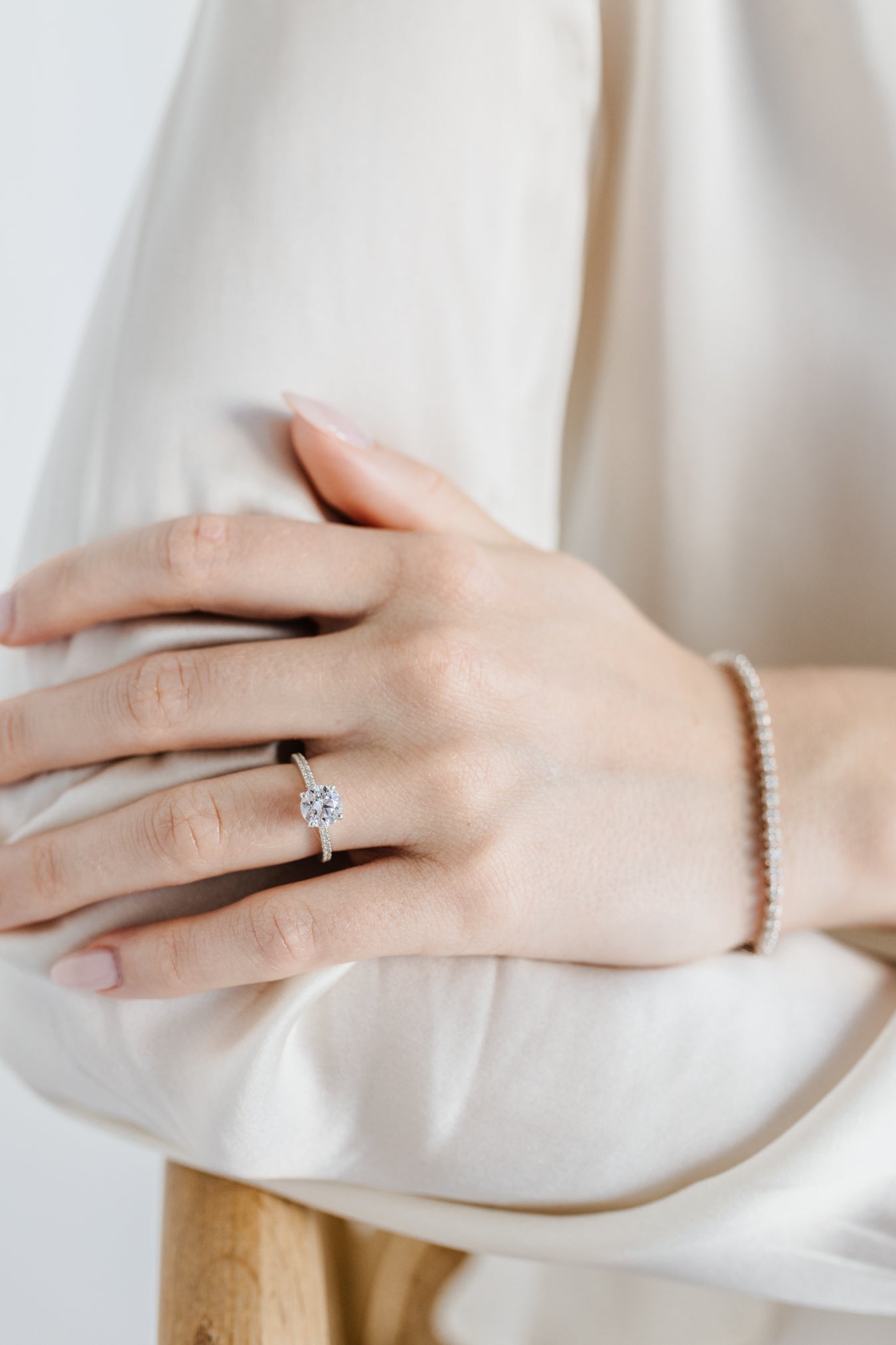 Round solitaire engagement ring with pave band - platinum