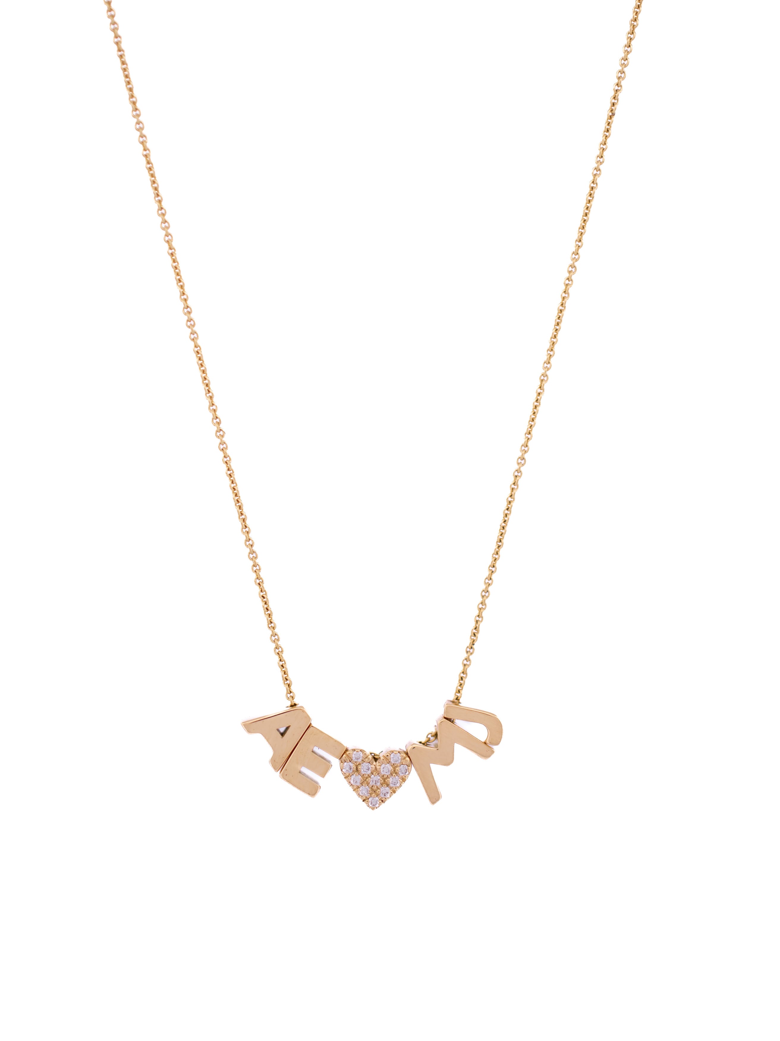 18-karat gold letter necklace with four gold letters and one diamond symbol